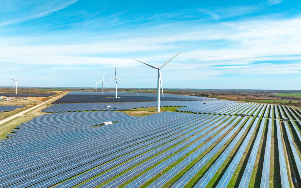 Wind turbines and solar panels at a renewable energy site
